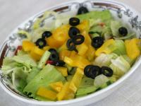 Salad is created by mixing chopped ice salad,...