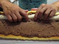 Place trimmed banana over one edge. Roll up the...