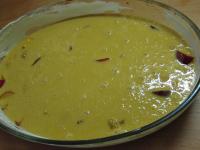 Add the flour with baking powder into the egg...