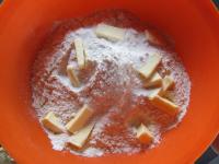 Put flour in a bowl, add butter cutted into small...