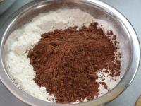Add the fine flour, baking powder and cocoa. Mix...