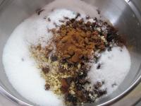 In a smaller bowl mix sugar, chopped nuts, raisins...