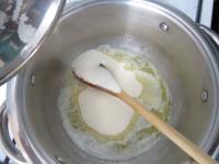 Bring water to a boil in an electric kettle or in...