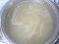 Add boiling water and stirring constantly simmer...