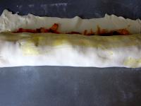 Roll the pastry. Spread beaten egg over uncovered...