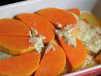 Grease a baking dish with oil, spread half of the...
