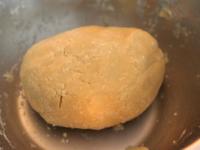 Work the dough, use a rolling pin to spread half...