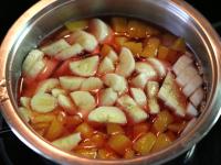 Pour hot gelatin mixture over fruit in the bowl....