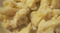 Wash cauliflower, separate it into individual...