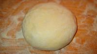 Add flour, pour warm milk, add the crumbled yeast...
