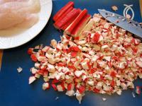 Let the crab sticks thaw and cut them into small...