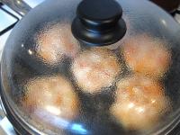 Flatten the balls with your hands and fry in a...