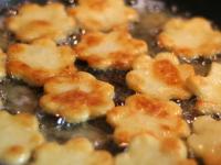 Fry the croquettes until golden brown in oil in a...