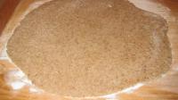 Mould the dough on a board topped by sugar....