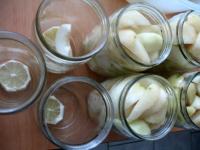 Put a slice of lemon at the bottom of the jar, add...