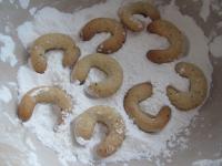 Wrap warm rolls in a mixture of powdered sugar and...