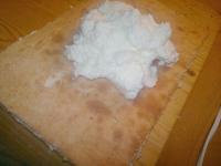 Spread the remaining cream on the top of the cake,...