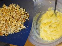 Whisk the butter with sugar, add cooled custard...