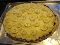Place banana rinds over the filling. Cover with...