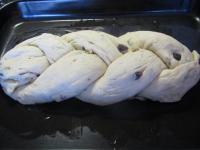 Put it to a greased baking sheet and leave it rise...