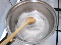 Add boiling water in a mug to an instant coffee....
