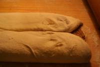 Let´s fold the dough. Fold it as an envelope....