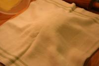 Cover with a clean tablecloth and leave for...