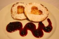 Sprinkle the drop scones with sugar, pour them...