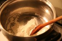 Put oil into a little cup, add flour, fry it for a...