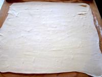 Let the frozen pangasius fish thaw. Roll the puff...