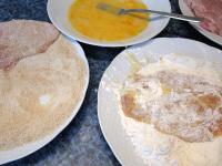 Dip it into the flour right away. Fry both sides...