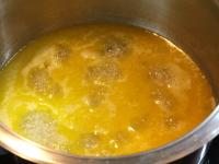 In a saucepan bring water to a boil with margarine...