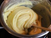 Let the mass cool and thereafter gradually stir in...