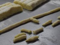 On a floured board divide dough into 6 pieces....
