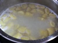 Place dumplings into a boiling water. In a while...
