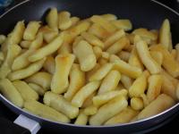 Fry cooked dumplings on butter until golden....