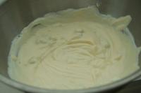 Sift the custard with sugar, add yolks and...