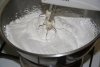 Beat egg whites with sifted sugar for about 5...