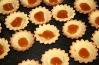 Remove tartlets from pans and add a little bit of...
