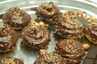 Pour melted chocolate on the surface and sprinkle...