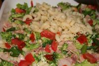 Pour prepared mixture over the pasta, blend a bit....