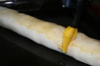 Brush the surface of the dough with whisked egg. ...