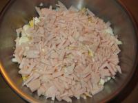 Ham folded into thin strands, pineapple celery...