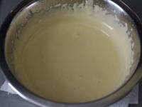 Whip the eggs on and pour slowly the melted...