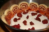 Add some strawberries onto the filling and then...