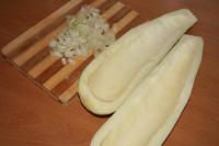 Peel one bigger zucchini, cut along and take the...