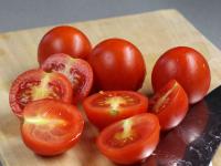 Cut bigger cherry tomatoes into the quarters....