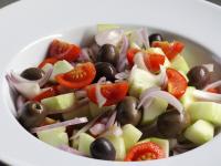 Gentle blend vegetable with the olives and place...