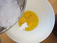 Beat the egg yolk with vanilla and icing sugar. ...