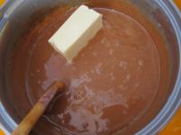 During the cooling of caramel stir in the butter....